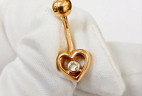 Золотой пирсинг в пупок